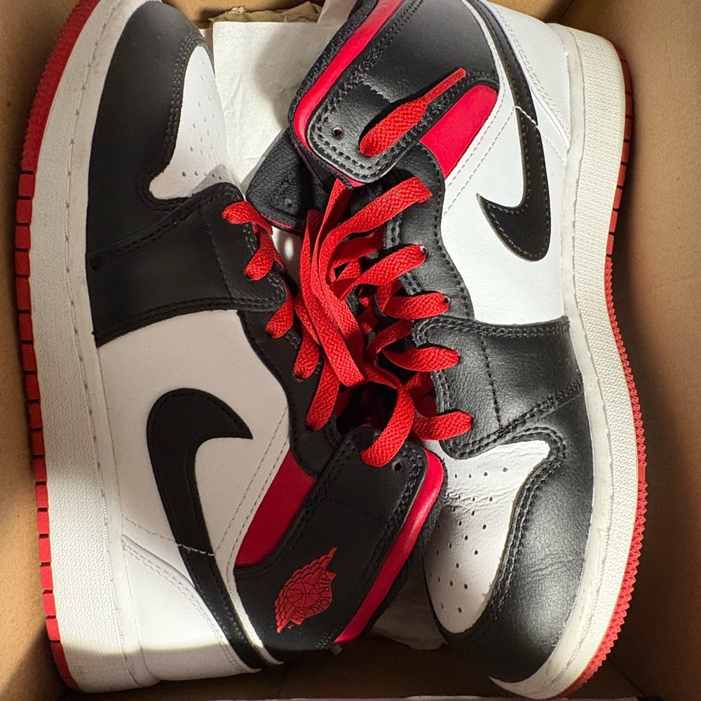 Jordan Kids Black, White, and Red Sneakers